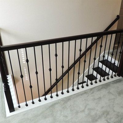 The stair railing measures 43.8 inches in length and is finished in black satin for a simple, modern look that adds an elegant touch. | YNV 43.8" H x 0.5" W x 0.5" D Hollow Double Section Stair Spindle Metal | 43.8 H x 0.5 W x 0.5 D in | Wayfair B0BC8KF549 Iron Spindle Staircase, Metal Stair Spindles, Black Stair Railing, Stair Railing Kits, Indoor Railing, Metal Stair Railing, Wrought Iron Stair Railing, Modern Stair Railing, Stair Spindles