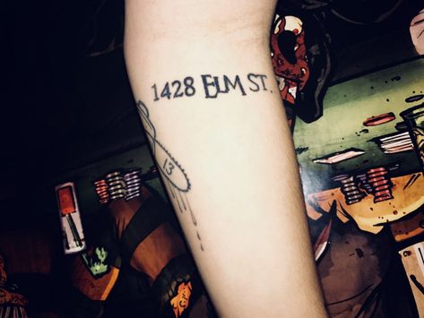 Horror movie tattoo idea 1428 elm street house number #Horrortats #horrortattoo #smalltattoo Horror Movie Patchwork Tattoo, Small Horror Movie Tattoo Ideas, Tattoo Ideas Horror Movies, Simple Horror Movie Tattoos, The Conjuring Tattoo, Nightmare On Elm Street Tattoo, Small Horror Tattoo Ideas, Small Horror Tattoo, Movie Tattoos Ideas