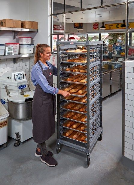 Cambro introduces the Ultimate Sheet Pan Rack, a reimagined sheet pan rack made with the same durable composite plastic materials as its highly successful Elements Series Camshelving®. The durable and reliable rack […] Restaurant Kitchen Organization, Menu Engineering, Foodtrucks Ideas, Bakery Shop Interior, Restaurant Kitchen Equipment, Commercial Pizza Oven, Kitchen Essentials List, Meat Restaurant, Bakery Kitchen