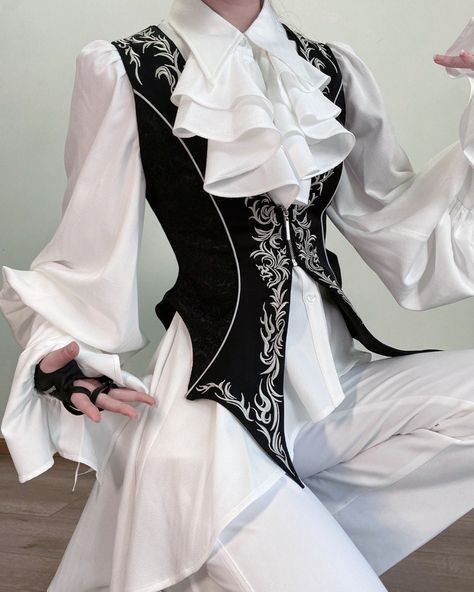 🦇 Embroidered Bat Wings Waistcoat with front zipper closure, available in black and white. Preorder now for $62.00! Shop here: https://www.devilinspired.com/extremely-luxurious-banquet #waistcoat #princestyle #oujifashion Howl's Moving Castle Fashion, Demonic Outfits, Ouji Fashion Female, Ouija Fashion, Prince Outfits Royal, Royal Prince Outfit, Aristocrat Fashion, Ouji Style, Victorian Mens Fashion