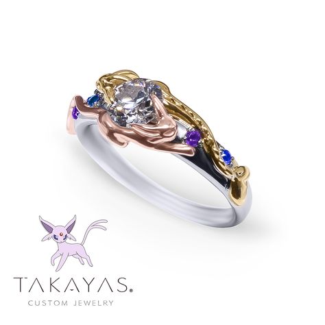 Pokémon Eeveelution Inspired Engagement Ring Anime Inspired Engagement Rings, Pokemon Ring Engagement, Pokemon Engagement Ring, Pokemon Wedding Ring, Pokemon Wedding Dress, Pokémon Decor, Dragon Engagement Ring, Zelda Engagement Ring, Pokemon Wedding