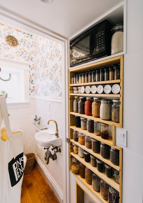 Great use of space - jars of food and a tiny microwave outside the kitchen/powder room. A Newly Remodeled, Maximalist Philadelphia Home: gallery image 15 Small Warehouse Design, Mid Century Maximalism, Kitchen Vibes, Custom Pantry, Pantry Wall, Warehouse Design, Pool Rooms, White Subway Tile, Furniture Warehouse