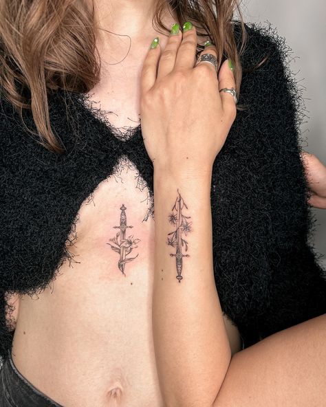 Hope everyone had a good long weekend 🍁I’m still catching up on posting so here are some matching sword/dagger tattoos for two lovely sisters we did a while ago 👯‍♀️ each one has each other’s favourite flower wrapping around the sword🗡️ such a fun session working with you both 🤍 Two Swords Crossed Tattoo, Dagger Flower Tattoo, Dagger And Rose Tattoo, Tattoos For Two, Dagger Tattoos, Matching Tattoos For Couples, Matching Couple Tattoos, Flower Wrapping, Dagger Tattoo