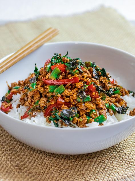 Try this easy recipe for vegetarian Thai basil tofu aka Pad Krapow. Stir fried ground tofu with garlic, ginger, and veggies in a spicy, savory soy sauce! #thairecipes #padkrapow #thaibasil #asianrecipes #vegetarianrecipes | drivemehungry.com via @drivemehungry Ground Tofu, Thai Basil Tofu, Basil Tofu, Pad Krapow, Vegetarian Lettuce Wraps, Vegetarian Thai, Asian Vegetarian Recipes, Fakeaway Recipes, Healthy Budget