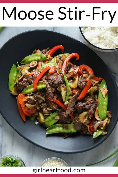 With plenty of crunchy veggies, flavourful moose meat and a simple stir-fry sauce, this moose stir-fry recipe is easy, colourful and so delicious! #mooserecipe #moosemeat #stirfry Moose Stew Meat Recipes, Moose Round Steak Recipes, How To Cook Moose Meat, Moose Heart Recipes, Wild Meat Recipes, Moose Recipes Meat, Moose Steak Recipes, Ground Moose Meat Recipes, Moose Stew Recipe