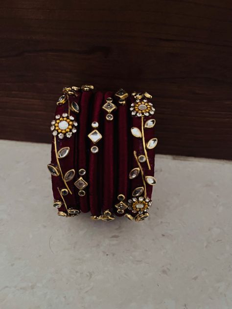 Maroon customised silk thread bangles Silk Thread Bangle Designs, Bangles Thread Design, Silk Thread Bangles Design Kundan, Thread Bangles Silk Handmade, Silk Thread Earrings Designs, Diy Earrings Materials, Fabric Bangles, Silk Thread Bangles Design, Silk Bangles