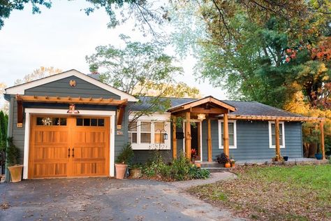 Rancher exterior remodel - craftsman portico and eyebrow pergola addition. Custom cedar woodwork with moravian star pendant and copper roof. Cedar Portico. Cedar Pavilion. Garage door remodel. Copper Gooseneck Light. Doylestown, PA remodelers Rancher Exterior, Eyebrow Pergola, Pergola Addition, Arts And Crafts Bungalow, Pergola Pictures, Craftsman Exterior, Copper Roof, Wall Seating, Exterior Remodel