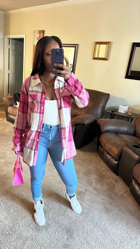 Girl standing in the mirror taking a selfie. She’s wearing a plaid pink shacket, cream ribbed seamless bodysuit, and light washed high waisted skinny jeans. She’s holding a pink bag Bodysuit Outfit Jeans Casual, Nike Blazer Mid 77 Outfit Woman, Uggs Fit, Outfits With Nike Blazers, High Top Nikes, Bodysuit Outfit Jeans, Pink Shacket, Nike Blazer Mid 77 Outfit, Fall Outfits Black Women