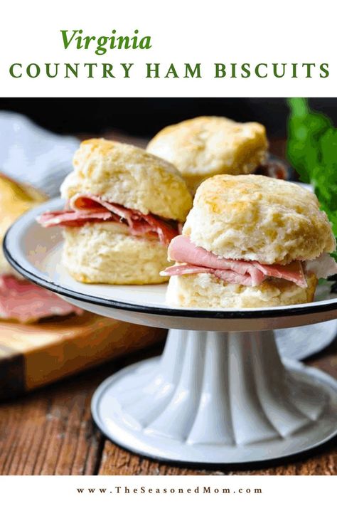 A pride of Virginia culture, country ham is a Southern tradition that has been loved for centuries. Country Ham Biscuits combine the salty, cured smoked meat with fluffy buttermilk biscuits. They're perfect for breakfast with eggs and grits, served as cocktail hors d’oeuvres or tailgating snacks, or prepared for grab-and-go munchies between meals. Enjoy a delicious Southern bite at any time of day! Biscuits And Ham, Eggs And Grits, Country Ham Biscuits, Country Ham Recipes, Tailgating Snacks, Fluffy Buttermilk Biscuits, Virginia Ham, Ham Biscuits, Southern Buttermilk Biscuits