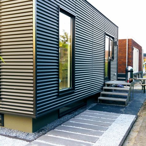 House Exterior Cladding, Corrugated Metal Siding, Flat Roof House, Tiny House Exterior, Steel Siding, Tin House, Metal Facade, House Cladding, Container Buildings