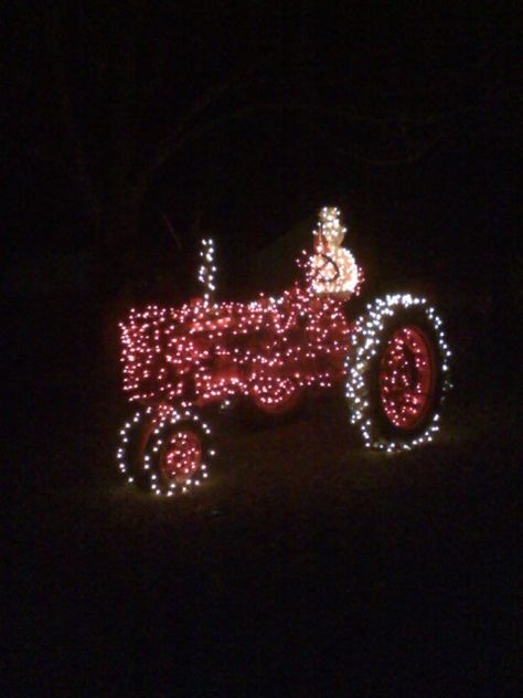 Our Farmall C tractor decorated for Christmas - 2013 Tractor With Christmas Lights, Tractor Decorated For Christmas, Tractor Christmas Lights, Ranch Christmas, Tractor Crafts, Tractor Lights, Tractor Decor, Christmas Tractor, Christmas Cars