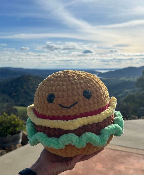 Satisfy your cravings for cuteness with our Crochet Plushie Cheeseburger - a playful and huggable creation that combines the love for food and cuddles! Handcrafted with meticulous detail, this delightful plushie is a quirky addition to your collection or a perfect gift for the burger enthusiast in your life. Pattern by: curiouspapaya Food Animal Crochet Patterns, Crochet Food Plushies Pattern Free, Crochet Food Animals, Big Crochet Plushies, Weird Crochet Plushies, Huge Crochet Plushies, Cute Crochet Plushies Food, Burger Crochet, Crochet Plushie Patterns