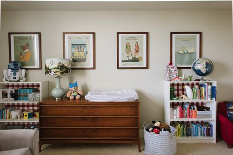 Baby boy's nursery inspired by Wes Anderson movies, designed by Maggie Stephens Interiors. Bainbridge Island and Seattle Area interior designer and decorator. Changing table and art wall. baby boy room, baby boy nursery, little boy nursery. Geometric side table, how to design a baby's room. Cool nursery ideas. Nursery ideas for apartment. Kid's room rental. Wes Anderson style nursery. Changing table on dresser. Mid century dresser. Cool Nursery Ideas, Wes Anderson Inspired, Island Interior, Geometric Side Table, Elegant Nursery, Apt Decor, Mom Things, Wes Anderson Movies, Mid Century Dresser