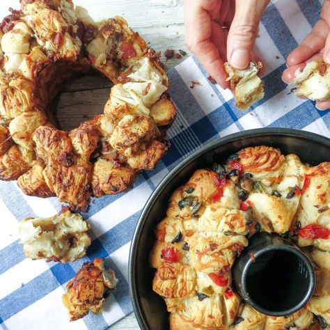 Savory Monkey Bread: 2-Ways are like its sweet namesake. It's a luscious treat that is so easy to prepare. A buttery pull-apart bread baked in a bundt pan with sauteed bacon and onion or black olive, mushroom, and pepper fillings tossed with chunks of flaky canned biscuits and cheese. Bundt Pan Stuffing, Biscuits And Cheese, French Donuts, Savory Monkey Bread, Chicken Party, Bundt Pan Recipes, Cake Bundt, Louisiana Woman, Party Sandwiches