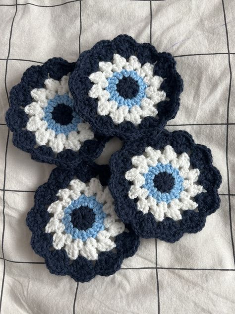 Handmade crochet evil eye protection coasters. Perfect for any occasion. Evil Eye Crochet, Crochet Evil Eye, Eye Crochet, Coasters Crochet, Evil Eye Protection, Crochet Stuff, Crochet Coasters, Crochet Flower, Car Coasters