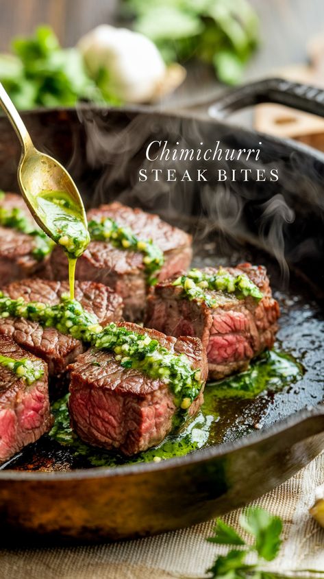 Sizzling steak bites in cast-iron skillet with drizzled chimichurri sauce, herbs and garlic, aptly captioned "Chimichurri Steak Bites". Chimichurri Ribeye Steak, Chimichurri Steak Bites, Recipes Using Chimichurri Sauce, Chimichurri Sauce Steak, Steak Wedding Dinner, Chimmichuri Recipes Easy, Ribeye Steak Bites, Finger Steaks, Cheese Crescent Roll Recipes