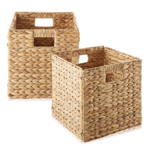 Set of 2 storage cubes: Includes two water hyacinth folding storage cube baskets. Each cube measures 10.5" W x 10.5" D x 10.5" H and is designed to fit most cube storage shelving units and cubby organizers. These storage baskets feature a sturdy metal frame and are built to last. Due to the handmade nature of these products, each piece is unique; please allow for slight variation in measurements. Handwoven baskets: Water hyacinth storage cubes, or utility baskets, offer a stylish and eco-friendl Organizing Blankets, Cube Shelving Unit, Cubby Organizer, Bedroom Laundry, Storage Cubes, Storage Shelving, Cube Organizer, Pantry Shelf, Shelving Units