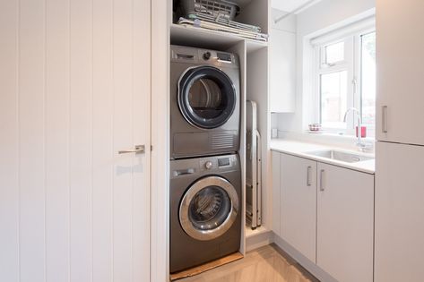 Is It Better to Stack a Washer and Dryer or Leave Them Side by Side? Garage Flooring Options, Side Units, Stackable Washer And Dryer, Tiny Closet, Build A Wall, Laundry Dryer, Wall Closet, Washing Machine And Dryer, Oscillating Tool