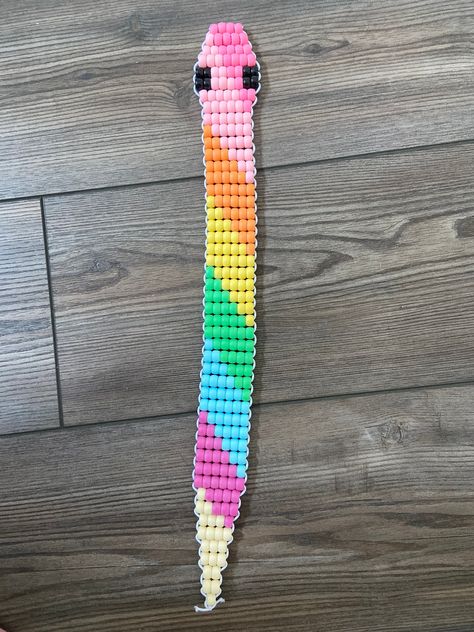 Handmade with pony beads and cloth covered string Pony Bead Rainbow Pattern, Diy Perler Bead Crafts Cute, Kandi Harness Pattern, Diy Pony Bead Crafts, Diy Bead Animals, Easy Quick Crafts For Kids, Bead Pet Patterns, Kandi Animal Pattern, Animal Bead Keychain Patterns