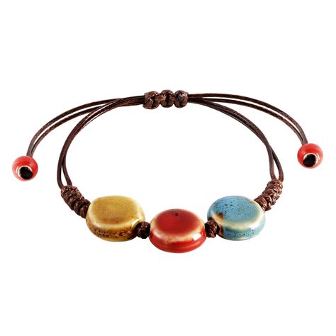 PRICES MAY VARY. VIBRANT HANDCRAFTED CERAMIC BEADS: Each bead on this bohemian bracelet is crafted from ceramic and uniquely colored, offering a vibrant spectrum from earthy greens to sunny yellows, making it a standout accessory. ADJUSTABLE LEATHER CORD: The robust leather cord is designed for longevity and comfort, featuring an adjustable knot that allows for a customized fit for any wrist size. PERFECT FOR LAYERING OR SOLO WEAR: Whether worn alone for a subtle hint of color or layered with ot Cute Bracelets To Make, Leather Cord Jewelry, Ceramic Bead Jewelry, Earthy Greens, Hippie Summer, Boho Style Bracelets, Beaded Braclets, Leather Jewelry Diy, Leather Cord Bracelets