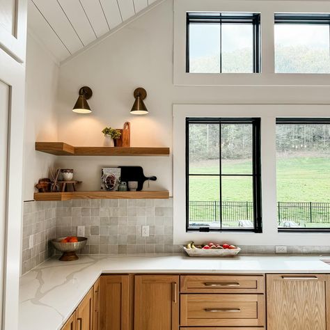 Still shots or videos? Videos can show more overall detail but goodness I love a good photograph. 😍 What do you prefer on here? The twins have had testing this week and they requested me to come visit at lunch so that’s where I’m headed in a little bit. Hope you have a great day! ⭐️ Kitchen details- Cabinets-custom natural white oak with clear flat finish Countertops-Calacatta vintage quartz Floating Shelves-solid white oak Sconces- @potterybarn Windows-Pella reserve aluminum clad & woo... Floating Shelves Kitchen, Quartz Kitchen Countertops, Oak Kitchen, Quartz Countertops, Custom Cabinets, White Oak, Floating Shelves, Custom Homes, Countertops