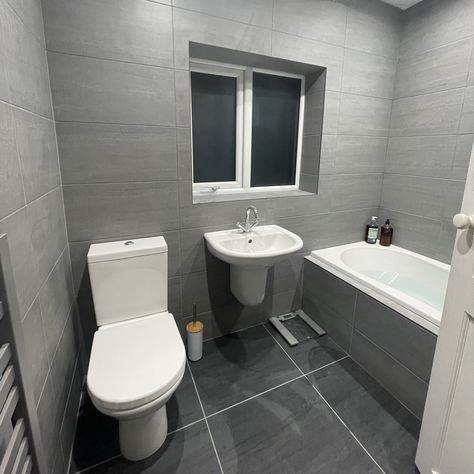 Inara Concrete and Coal | Topps Tiles Fully Tiled Bathroom, Modern Guest Bedroom, Gray And White Bathroom, Toilet Decor, Grey Bathroom Tiles, Shower Rooms, Tile Adhesive, Bespoke Bathroom, Tiled Hallway