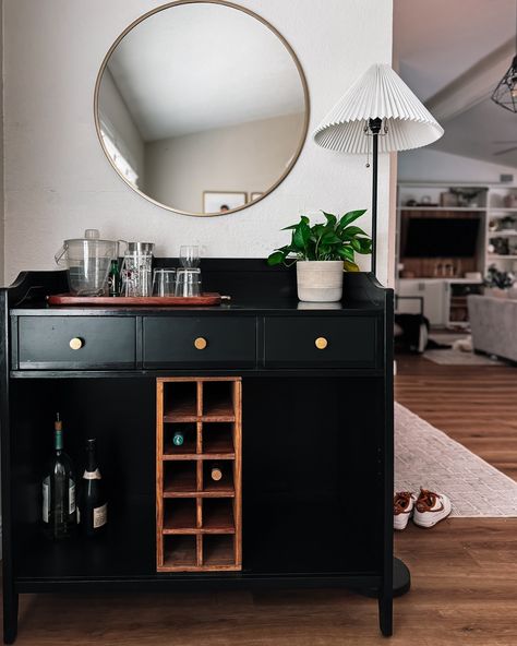 With a few simple changes, a baby changing table can quickly become a stunning bar cabinet! I found this Pottery Barn piece on @facebookmarketplace for $30 and knew I could use it SOMEHOW…coffee bar, boozy bar, potting bench… The goal was to flip and sell it, but I’m having way too much fun styling it for fall/halloween! What would you do?! Sell or keep it? #beyondpaint #diyhomedecor #furnituremakeover #diyfurnituremakeover #diyhomeprojects #diyhacks Changing Table To Bar Cart, Black And Blue Changing Table, Black Changing Table Dresser, Espresso Changing Table, Black Nursery Dresser Changing Tables, Pottery Barn Changing Table, Beyond Paint, Thrifted Home, Baby Changing Table