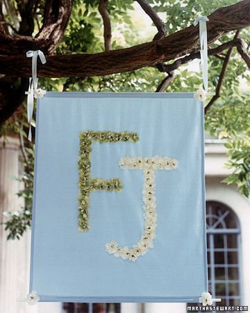 This monogrammed banner is a cute decoration that also serves to notify your guests of the wedding's location Wedding Banner Diy, Banner Diy, Wedding Altars, Wedding Banner, Diy Wedding Flowers, Outdoor Wedding Decorations, Aisle Decor, Martha Stewart Weddings, Wedding Fabric