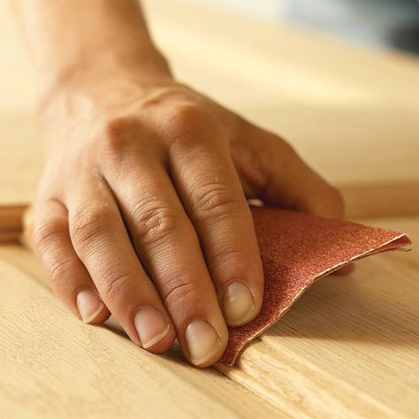 Hand-Sand the Curves - Sand curved surfaces—and other areas an electric sander can't reach—by hand. Treat all areas equally, using the same progression of sandpaper grits for both hand and power sanding. Start with 80-grit to sand away blemishes, then use 120-grit and finally 180-grit. Using these exact grits isn't vital (100-150-180 works too), but it's important to progress in steps, removing deeper scratches and leaving finer scratches each time. Wood Finishing Techniques, Staircase Pictures, How To Apply Polyurethane, Painted Staircases, Wood Finishing, Whitewash Wood, Storing Paint, Wood Trim, Woodworking Techniques