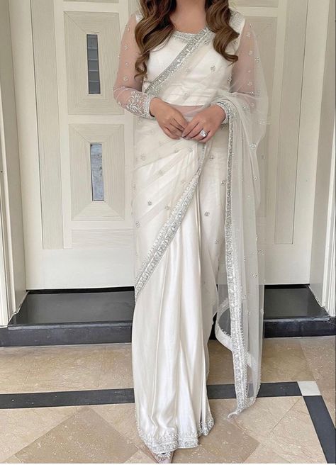 Elegant Off White Pre-draped Saree For Festive, Elegant Off-white Pre-draped Saree With Sheer Dupatta, Elegant Semi-stitched Pre-draped Saree With Sheer Dupatta, Elegant Pre-draped Saree For Navratri, Elegant Off White Pre-draped Saree With Resham Embroidery, Elegant Off-white Choli With Dupatta, Elegant Floor-length Blouse With Sheer Dupatta, Off White Blouse Piece For Reception With Traditional Drape, Off White Traditional Drape Blouse Piece For Reception