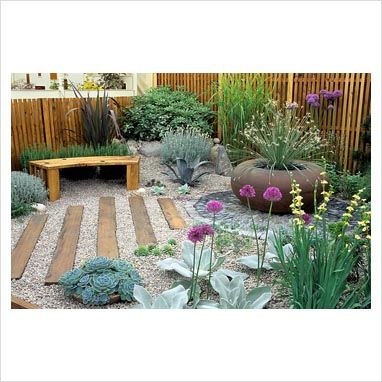 GAP Photos - Garden & Plant Picture Library - Gravel garden with timber bench and large rusty container - GAP Photos - Specialising in horticultural photography Patio Ideas For Dogs, Gravel Landscaping, Seaside Garden, Hgtv Garden, Gravel Garden, Coastal Gardens, Low Maintenance Garden, Mediterranean Garden, Garden Seating