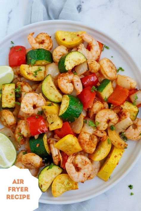 Looking for a fresh air fryer recipe that will leave you feeling full and healthy? This easy air fryer shrimp and vegetable dinner comes together with healthy low carb ingredients and is ready in under 30 minutes making it the perfect weeknight recipe! Airfryer Shrimp Recipes Healthy, Low Carb Shrimp Meal Prep, Healthy Shrimp And Veggie Recipes, Prawn Meal Prep, Air Fryer Shrimp And Vegetables, Air Fryer Shrimp And Veggies, Air Fryer Meal Prep Ideas, Lunch With Vegetables, Easy Low Calorie Air Fryer Meals