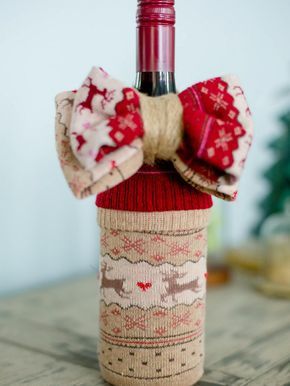 The entertaining experts at HGTV.com share 10 creative ways to wrap a wine bottle gift for the holidays. Wrap A Wine Bottle Gift, Wrap A Wine Bottle, Christmas Socks Exchange, Wine Bottles Gift Wrap, Bottle Gift Wrapping, Wine Bottle Crafts Christmas, Wrapped Wine Bottles, Wine Bottle Gift