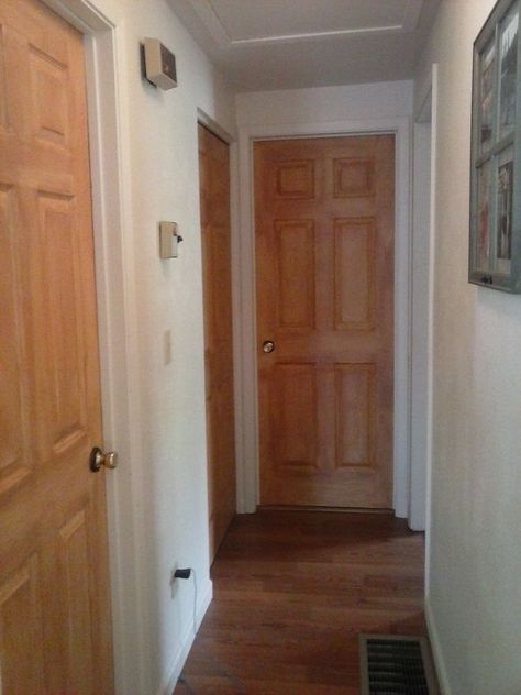 For less than $50.00 I gave my home the look of expensive Oak doors without paying the Oak Door price. Here is what my doors looked like when I got started. They are BOOORING! I wanted to give them a upgrade, but didn't want to spend 120.00 per door since I have 5 of them in the hallway. So I decided to get out my paint brushes and start making some magic happen... Here is a quick peek at my hallway. It is all white and has NO character at all. The first step was to paint the doo… Vintage Sinks, Drawer Makeover, Cable Spools, Cupboard Colors, Diy Kitchen Cabinets Makeover, Closet Wood, Sock Gnomes, Wood Screen Door, Beaded Trees