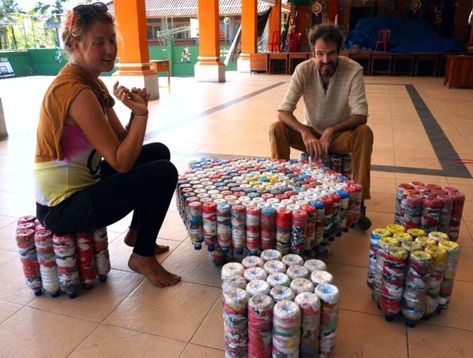 A man and a woman sit on furniture made out of ecobricks Brick Projects, Eco Furniture, Reuse Plastic Bottles, Diy Plastic Bottle, Plastic Trash, Trash Art, Plastic Bottle Crafts, Eco Living, Recycled Projects