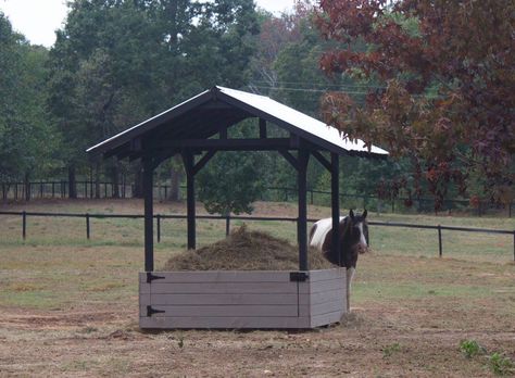 Round bale feeder for horses. Horse Square Bale Feeder, Horse Shelter With Hay Feeder, Round Bale Hay Feeder For Horses, Hay Hut, Round Bale Feeder, Horse Shelters, Hay Feeder For Horses, Horse Feeder, Horse Shed