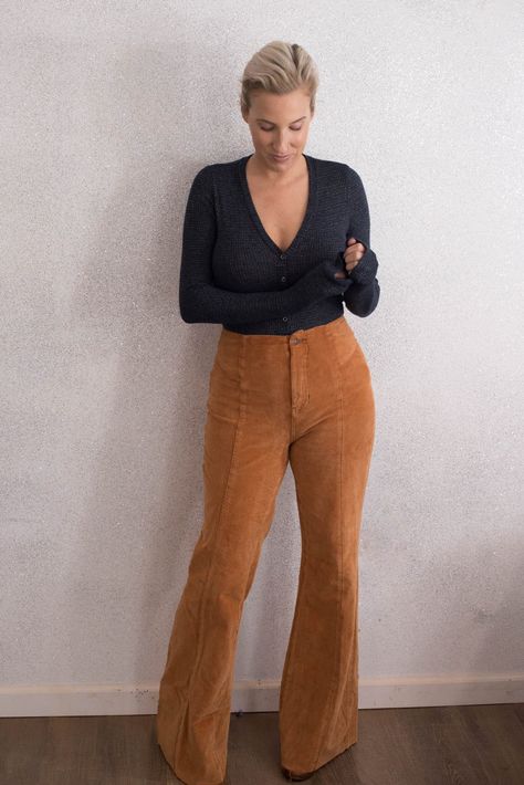 THE FREE PEOPLE CRVY CORD FLARES ARE SO FREAKIN' GOOD (HERE ARE 5 WAYS TO WEAR 'EM) |        We can't get over these Free People CRVY cord flares in 1 of our fav fall colors: wild honey. We're pairing 'em with nursing-friendly tops, 5 ways. | #TheMomEditStyle #FallFashion #CorduroyPants #FallColorTrends #FreePeopleFlares #HighWaistCords #HighWaistFlares #NursingFriendlyTops #SustainableFashion #BodysuitOutfits #OffTheShoulderTops #TunicOutfits #GraphicTeeOutfits #CurvyBellBottoms Flare Corduroy Pants Outfit, Corduroy Flare Pants Outfit, Cord Flares, Flare Pants Outfits, Brown Pants Outfit, Corduroy Pants Outfit, Nursing Friendly Tops, Postpartum Fashion, Boho Street Style