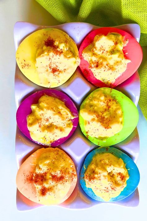 How to color deviled eggs for Easter recipes or fun party foods. How to make colored egg whites to match party themes, baby shower recipes or birthday party foods. #coloredeggs #eggdye #eastereggs #partyfoods Color Deviled Eggs, Birthday Party Foods, Easy Peel Boiled Eggs, Baby Shower Recipes, Colored Deviled Eggs Recipe, Deviled Eggs For Easter, Dyed Deviled Eggs, Peeling Boiled Eggs, Colored Deviled Eggs