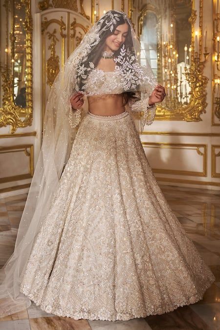 Buy Ivory Organza Embroidered Floral Square Neck Blouse Bridal Lehenga Set For Women by Seema Gujral Online at Aza Fashions. Seems Gujral Lehenga, Ivory Wedding Lehenga, Seema Gujral Bridal Lehenga, Seema Gujral Lehenga, Indian Wedding In Italy, Reception Lengha Bridal, Nikkah Lengha, Reception Indian Bride, Indian Bridal Lehenga White