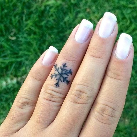 Small Hand Tattoo Ideas, Small Snowflake Tattoo, Winter Babies, Winter Tattoo, A Small Tattoo, Snow Tattoo, Hand Tattoo Ideas, Thumb Tattoos, Snow Flake Tattoo