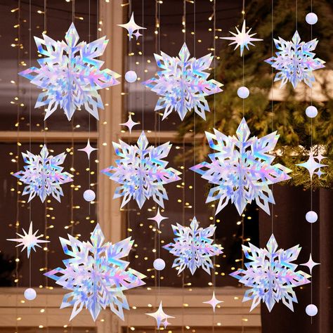 PRICES MAY VARY. Super Value Pack: The package includes 18pcs 3D iridescent snowflake ornaments + 1 pcs 9.8ft hanging snowflake garland with 24 snow flakes. All the tiny pieces have been punched out, you don't have to waste time cleaning tiny pieces. Premium Material: The hanging snowflakes from ceiling are made of high-grade paper, which is water-repellent, sturdy, and reusable. Each strand is individually packed and assembled, easy to hang and put up and take down. Easy to Use: Just fold along Hanging Snowflakes From Ceiling, Snowflakes From Ceiling, Winter Wonderland Christmas Decorations, 3d Iridescent, Hanging Snowflakes, Snowflake Birthday Party, Snowflake Crafts, Craft Basket, Diy Christmas Snowflakes