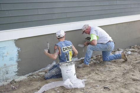 A new exterior finish was started this week. The stucco crew came and secured… Exterior Foundation Ideas, Stucco Foundation Ideas, Painting Concrete Foundation Of House, Parging Foundation Ideas, Concrete Foundation Makeover, Foundation Ideas Exterior, Painting Foundation Of House, House Foundation Ideas, Stucco Foundation