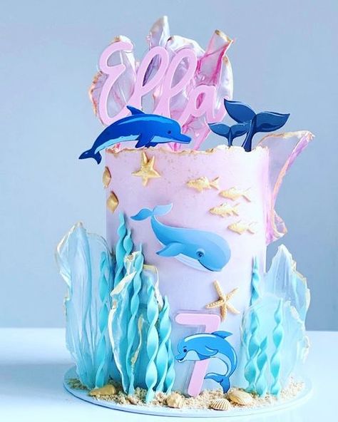 #oceancake #seacake #undertheseaparty #undertheseacake #dolphincake #whalecake #dolphinlover #whalelover #oceanlover #ricepapersail #ombrecake #ombrecakes #pastelcake #pinkcake #goldsplatter #buttercreamcake #tallcake #tallcakes #buttercreamart #cakesofinstagram #cakesofig #cakedesign #cakedesigner #7thbirthdayparty #7thbirthdaycake #kidsbirthdaycake #nifood #belfastfood #eastbelfast Dolphin Birthday Cakes, Gold Buttercream, Whale Cakes, Dolphin Cakes, Ocean Cakes, Two Tier Cake, Pastel Cakes, Sea Cakes, Tall Cakes