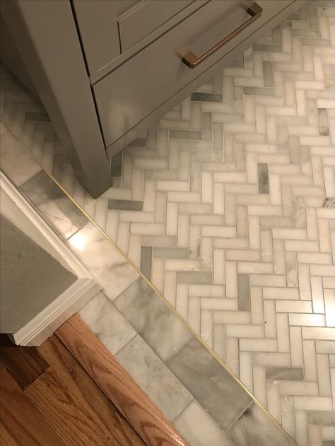 Marble herringbone and inlaid solid brass detail; bathroom tile floor Marble Herringbone Bathroom, Herringbone Bathroom Floor, Herringbone Kitchen Backsplash, Floor Herringbone, Marble Herringbone Floor, Bathroom Tile Floor, Bathroom Brass, Design Interior Baie, Herringbone Tile Floors