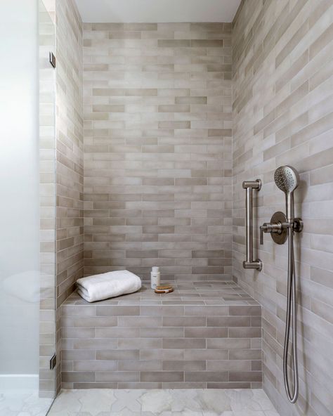 Tiled bench in shower in neutral bathroom designed by Marin interior designer California Daydreams. California Casual Interior Design Bathroom, California Bathroom, Satori Shower Tile, California Casual Bathroom, Shower With Stripe Of Tile, Cali Sand Porcelain Tile, California Design Interior, Neutral Bathrooms Designs, Neutral Bathroom