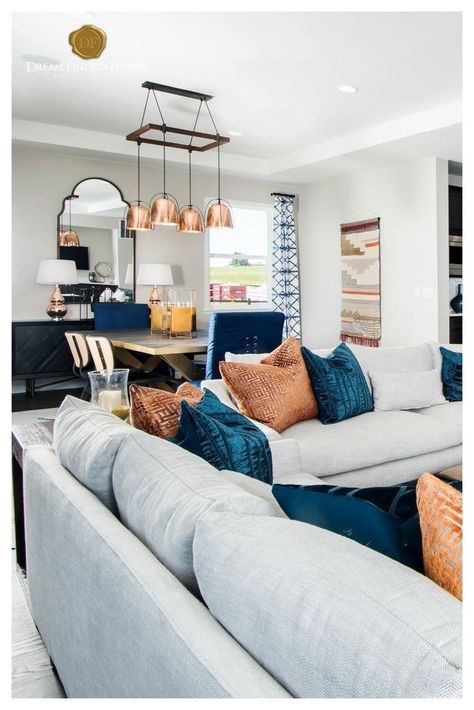 Blue And Copper Living Room, Orange Accents Living Room, Pendant Lighting Living Room, Modern Curtain Design, Blue And Orange Living Room, Burnt Orange Living Room, Pendant Lighting Living, Copper Living Room, Navy Living Rooms