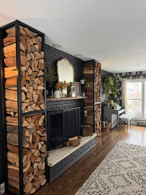 A simple yet dramatic way to store firewood indoors. Functional design all the way! Wood Next To Fireplace Firewood Storage, Firewood Wall Indoor, Wood Chopping Firewood, Firewood Storage Indoor Living Rooms, Built In Log Storage, Indoor Wood Storage Ideas, Indoor Wood Rack, Wood Storage Indoor, Firewood Wall