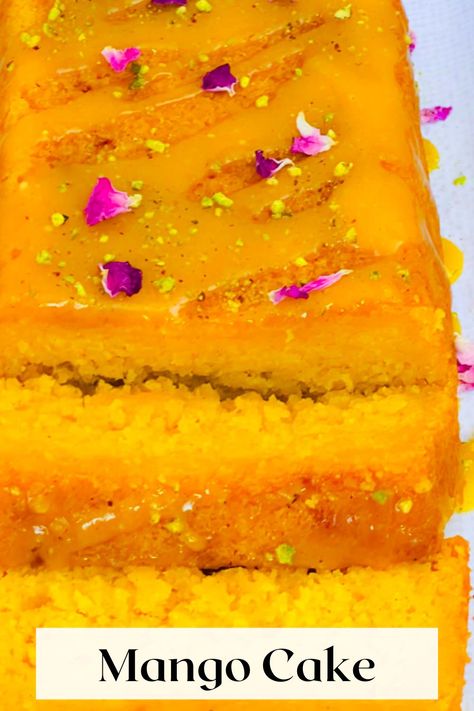 Indulge in the tropical flavors of juicy mangoes with this delicious and easy-to-make eggless mango cake with mango glaze. This cake is flavorful, moist, and bursting with the sweet and fruity taste of ripe mangoes, making it the perfect dessert for any occasion. Made without condensed milk and using simple ingredients, this recipe is fail-proof and doesn't require any special equipment. Mango Glaze, Potato Cauliflower Curry, Cake With Mango, Easy Indian Dessert, Fluffy Cupcakes, Egg Puff, Indian Cookbook, Mango Pulp, Mango Cake