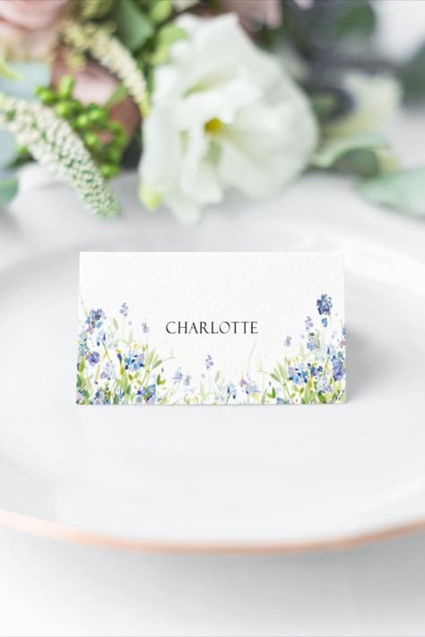 Blue and green forget me not Wildflower print tent fold place card printed on textured white card. Shown on a white plate with greenery in the background Japanese Theme Parties, Name Card Wedding, Name Cards Wedding, Place Name Cards, Place Setting Cards, Wedding Place Names, Table Name Cards, Bachelorette Ideas, Wedding Place Settings