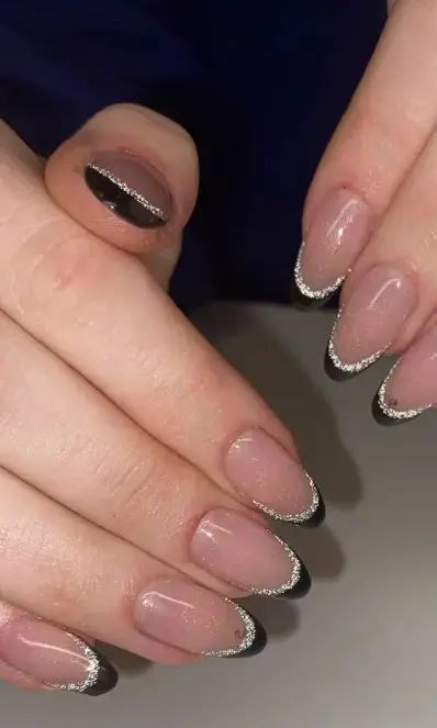 26 Best New Year’s Nails That Are Getting Hot in 2023 French Tips For New Years, New Yrs Nails Nailart, New Years Eve French Tip Nails, New Years Eve Manicure, New Years Nails Round, Silver Nye Nails, Net Years Nails, New Year’s Eve Nails Black, Newyear Nails New Years Eve